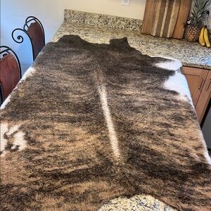 Brown and White Cow Animal Hide Rug